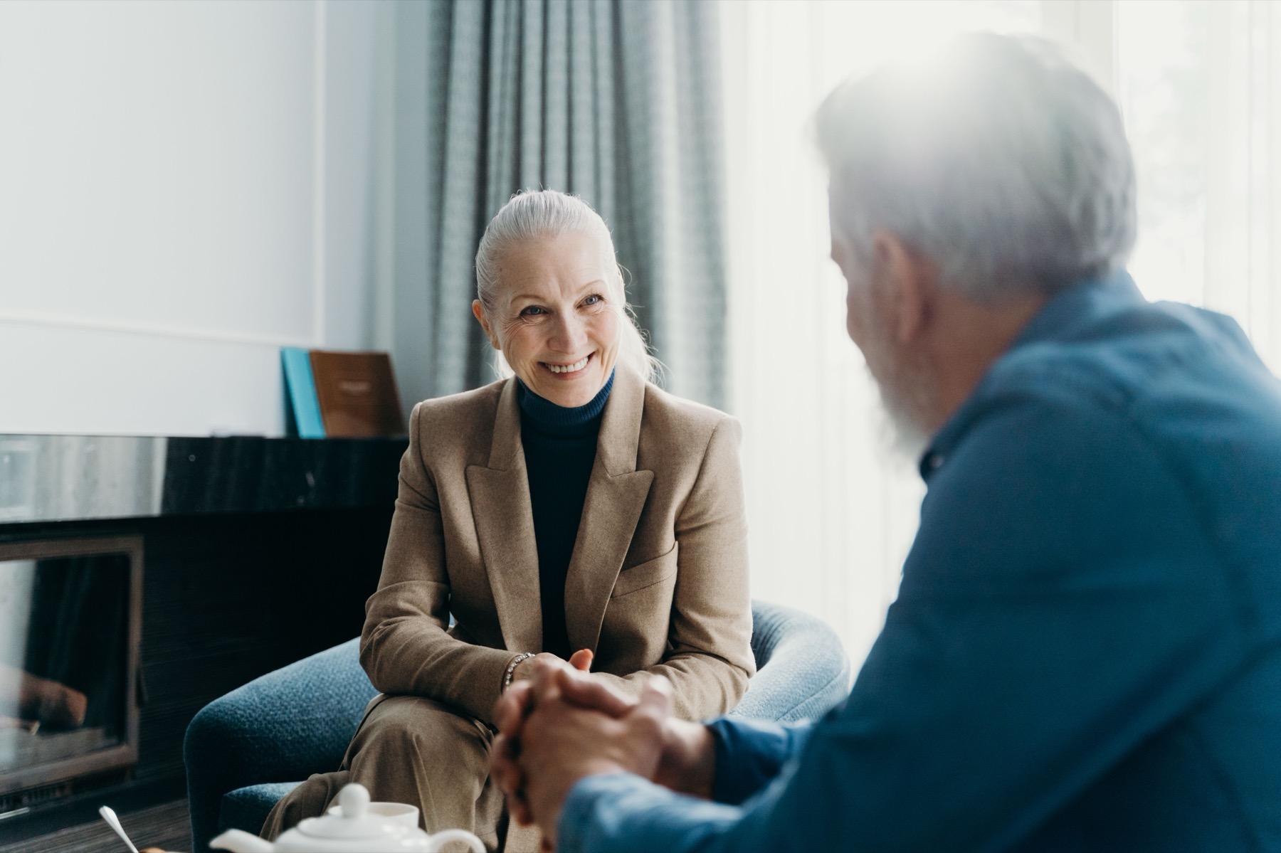 Calm care conversation between an older adult and a care partner